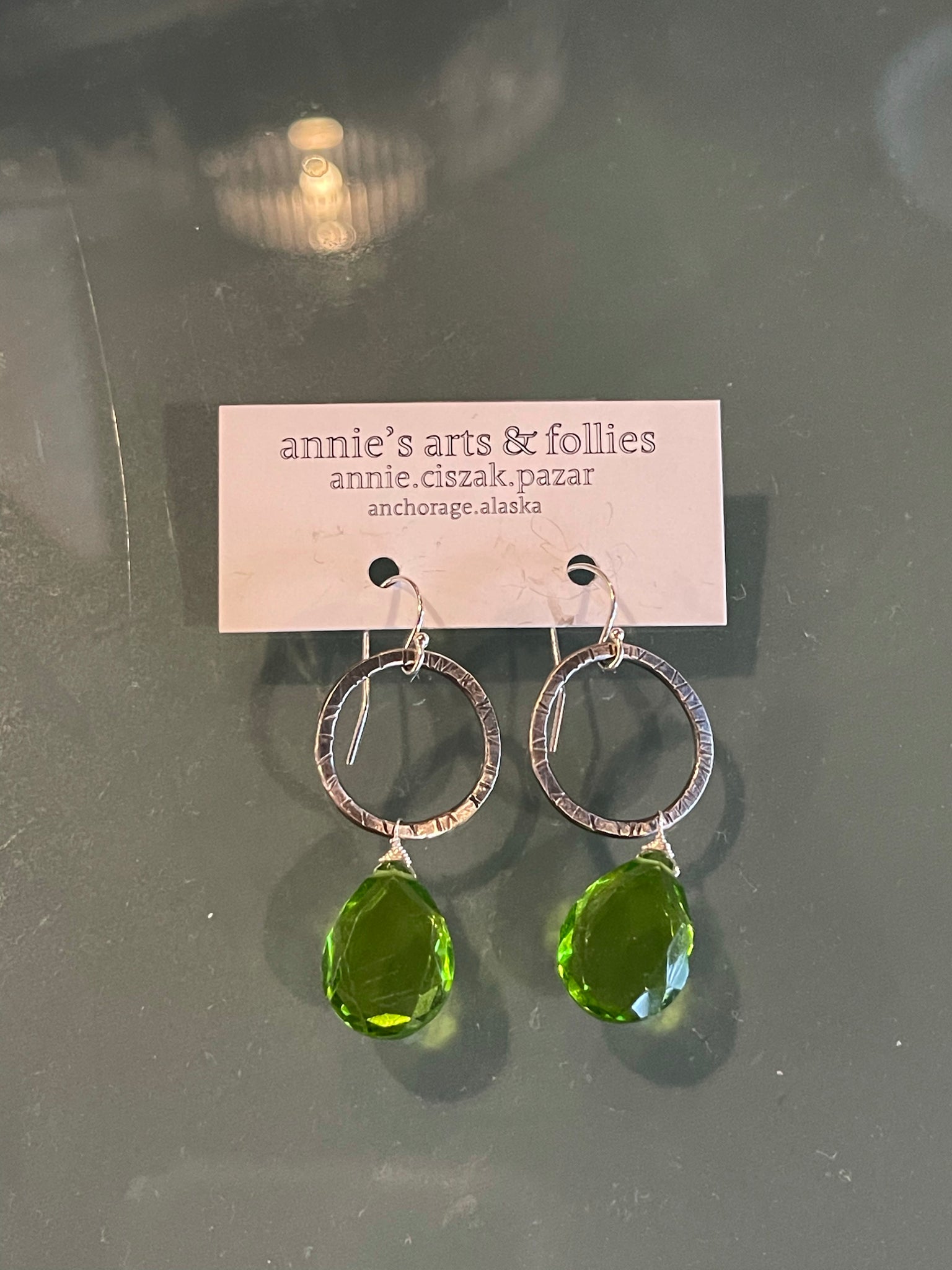 Sterling Silver Hoop Earrings w/ Green Gems